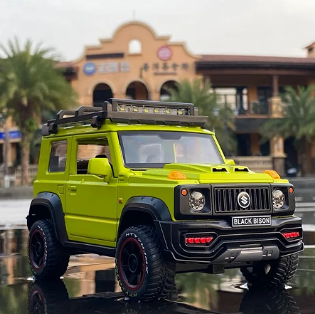 A green SUZUKI Jimny alloy model car with black details, placed on a wet surface, showcasing its realistic design.